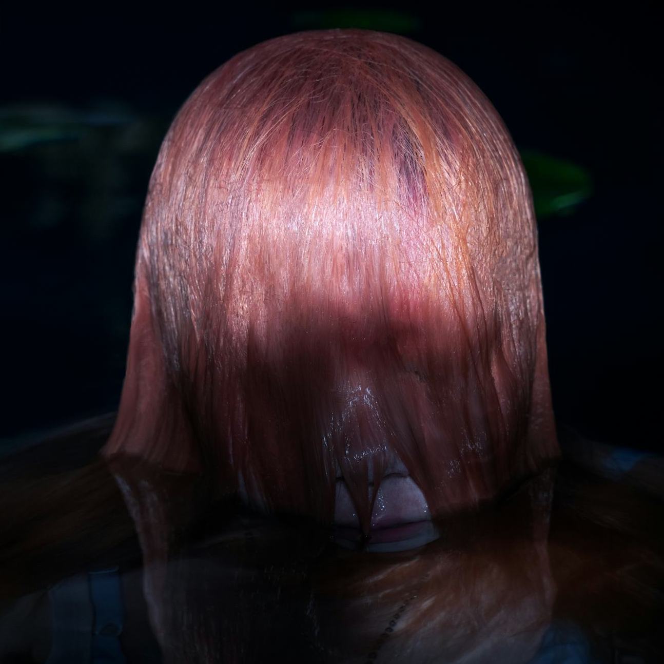 Wisp emerging from underwater head shot.