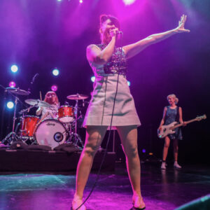 Bikini Kill on stage.