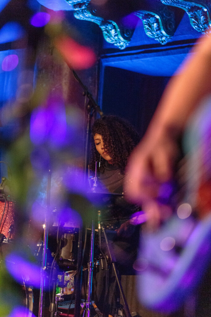 Audrey Paris Johnson of La Luz playing drums on stage