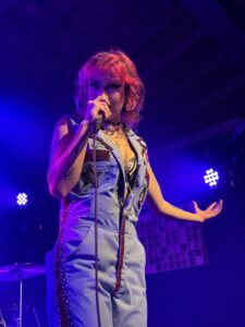 MARIS smiling down the camera